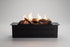 Black fire pit with flames and logs on a gray background